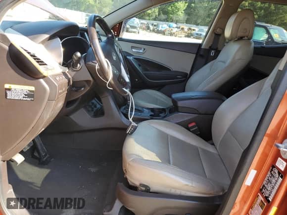 2014 Hyundai Santa Fe z VIN 5XYZWDLA8EG141059, wystawiony jako Copart lot #81478055 z przebiegiem 165 295 mil mil oraz Szkoda całkowita • Salvage title. Historia ofert i sprzedaży dostępna na DreamBid. Obrazek 7.