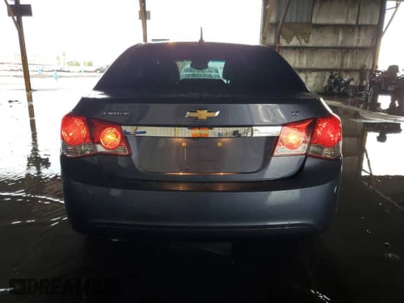 2014 Chevrolet Cruze 1LT z VIN 1G1PC5SB2E7391015, wystawiony jako Copart lot #84430765 z przebiegiem 72 993 mil mil oraz Szkoda całkowita • Salvage title. Historia ofert i sprzedaży dostępna na DreamBid. Obrazek 6.