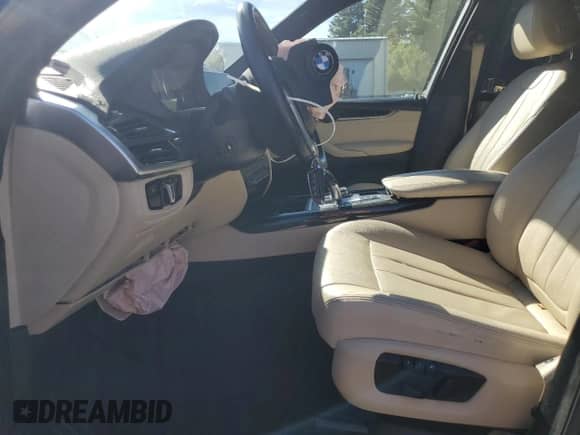 2017 BMW X5 xDrive35i with VIN 5UXKR0C56H0V68236, listed as a Copart auction lot 84898355 with Not provided miles and Salvage title. Bid and sale history available at DreamBid. Image 7.