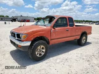 1997 Toyota Tacoma z VIN 4TAWM72N1VZ233030, wystawiony jako Copart lot #59620565 z przebiegiem 348 613 mil mil oraz Szkoda całkowita • Salvage title. Historia ofert i sprzedaży dostępna na DreamBid. Obrazek 1.
