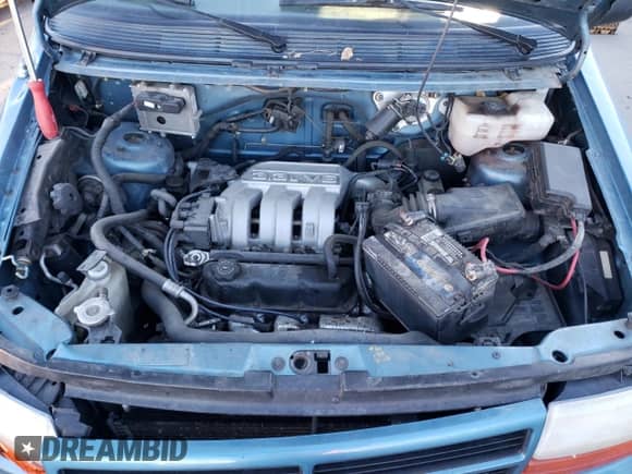 1994 Dodge Caravan Grand SE with VIN 1B4GH44R1RX330819, listed as a Copart auction lot 83548684 with 187,408 mi miles and Salvage title. Bid and sale history available at DreamBid. Image 12.