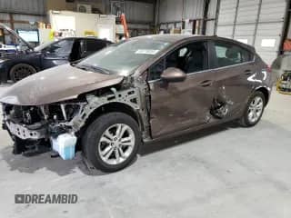 2019 Chevrolet Cruze LT с VIN 3G1BE6SMXKS601742, выставлен на аукционе Copart как лот 69778055 с пробегом 86 617 миль миль и Списание • Salvage title. История ставок и продаж доступна на DreamBid. Изображение 1.