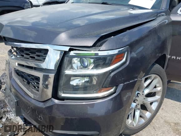 2015 Chevrolet Tahoe LT with VIN 1GNSCBKC6FR138401, listed as a IAAI auction lot 42940030 with 241,046 mi miles and . Bid and sale history available at DreamBid. Image 6.