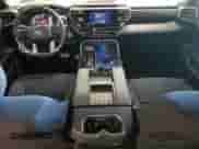 2023 Toyota Tundra SR5 с VIN 5TFLA5ECXPX016282, выставлен на аукционе Copart как лот 70107825 с пробегом 14 933 миль миль и Списание • Salvage title. История ставок и продаж доступна на DreamBid. Изображение 8.