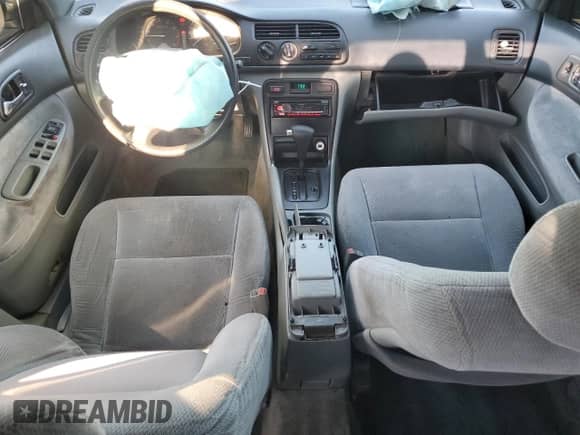 1996 Honda Accord LX z VIN 1HGCD5632TA300428, wystawiony jako Copart lot #70677085 z przebiegiem 153 575 mil mil oraz Szkoda całkowita • Salvage title. Historia ofert i sprzedaży dostępna na DreamBid. Obrazek 8.