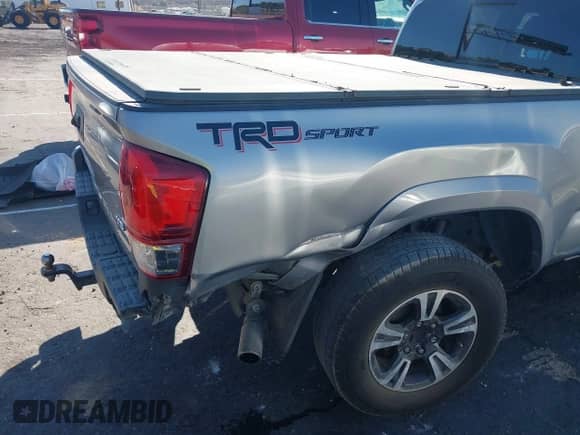 2017 Toyota Tacoma SR5 with VIN 3TMBZ5DNXHM006608, listed as a IAAI auction lot 43412044 with 114,937 mi miles and . Bid and sale history available at DreamBid. Image 6.