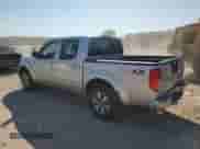 2012 Nissan Frontier SL z VIN 1N6AD0EV5CC410922, wystawiony jako Copart lot #81819905 z przebiegiem 128 249 mil mil oraz Czysty tytuł • Clean title. Historia ofert i sprzedaży dostępna na DreamBid. Obrazek 2.