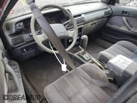 1991 Toyota Camry DLX z VIN 4T1SV21EXMU434615, wystawiony jako Copart lot #81491145 z przebiegiem 148 041 mil mil oraz Czysty tytuł • Clean title. Historia ofert i sprzedaży dostępna na DreamBid. Obrazek 8.