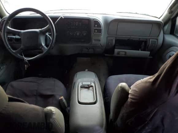 1999 Chevrolet Suburban с VIN 3GNEC16R3XG247177, выставлен на аукционе Copart как лот 75674564 с пробегом 132 546 миль миль и На запчасти • Non repairable. История ставок и продаж доступна на DreamBid. Изображение 8.