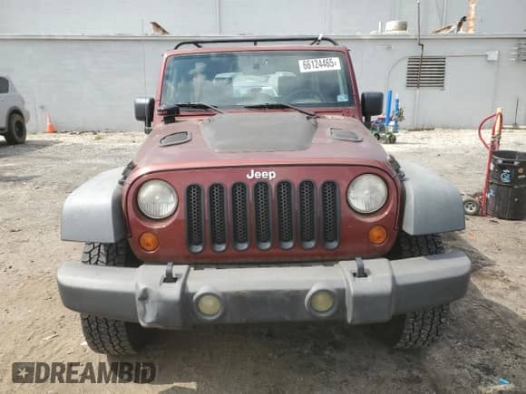 2007 Jeep Wrangler Unlimited Rubicon with VIN 1J8GA69147L164363, listed as a Copart auction lot 66124465 with 142,365 mi miles and Clean title. Bid and sale history available at DreamBid. Image 5.