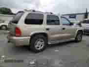 2003 Dodge Durango SLT with VIN 1D4HR48N83F560384, listed as a Copart auction lot 69909915 with 187,826 mi miles and Salvage title. Bid and sale history available at DreamBid. Image 3.