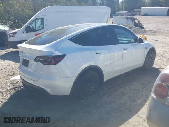 2022 Tesla Model Y Long Range z VIN 7SAYGDEE5NF321358, wystawiony jako IAAI lot #43439727 z przebiegiem 24 003 mil mil oraz . Historia ofert i sprzedaży dostępna na DreamBid. Obrazek 4.