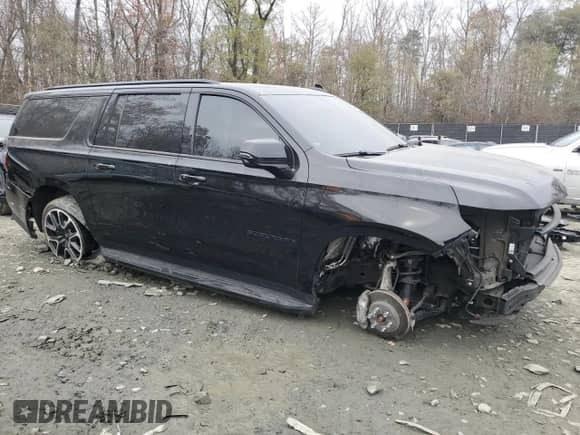2022 Chevrolet Suburban RST с VIN 1GNSKEKL0NR282092, выставлен на аукционе Copart как лот 79947854 с пробегом 102 995 миль миль и Списание • Salvage title. История ставок и продаж доступна на DreamBid. Изображение 4.