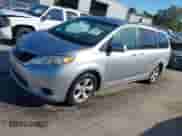 2011 Toyota Sienna LE AAS with VIN 5TDKK3DC7BS075464, listed as a IAAI auction lot 43458980 with 172,183 mi miles and . Bid and sale history available at DreamBid. Image 2.