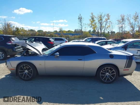 2018 Dodge Challenger R/T Scat Pack with VIN 2C3CDZFJ2JH300887, listed as a IAAI auction lot 43447415 with 83,601 mi miles and . Bid and sale history available at DreamBid. Image 14.