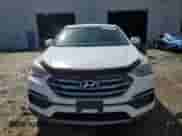 2018 Hyundai Santa Fe 2.4L z VIN 5XYZTDLB0JG564777, wystawiony jako Copart lot #82300615 z przebiegiem 137 081 mil mil oraz Szkoda całkowita • Salvage title. Historia ofert i sprzedaży dostępna na DreamBid. Obrazek 5.