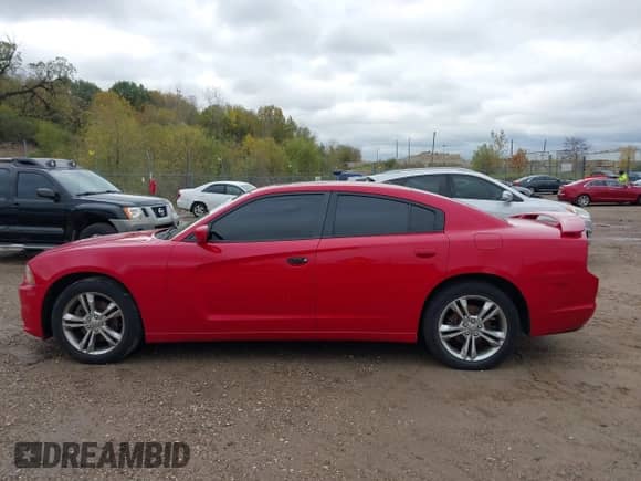 2013 Dodge Charger SXT с VIN 2C3CDXJG5DH541184, выставлен на аукционе IAAI как лот 43513116 с пробегом 202 634 миль миль и . История ставок и продаж доступна на DreamBid. Изображение 14.