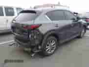 2022 Mazda CX-5 S Select z VIN JM3KFBBM2N0573466, wystawiony jako IAAI lot #42604117 z przebiegiem 35 729 mil mil oraz . Historia ofert i sprzedaży dostępna na DreamBid. Obrazek 4.