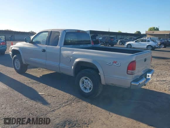1999 Dodge Dakota SLT с VIN 1B7GG22Y9XS165164, выставлен на аукционе IAAI как лот 42904277 с пробегом 194 835 миль миль и . История ставок и продаж доступна на DreamBid. Изображение 3.