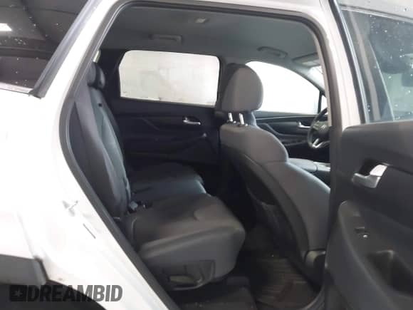 2021 Hyundai Santa Fe SE with VIN 5NMS1DAJ2MH352913, listed as a IAAI auction lot 43548098 with 93,758 mi miles and . Bid and sale history available at DreamBid. Image 8.