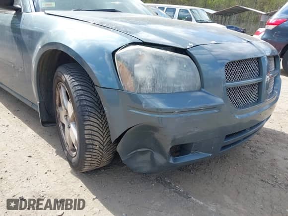 2005 Dodge Magnum SXT with VIN 2D4GZ48V15H647072, listed as a IAAI auction lot 42037095 with 187,904 mi miles and . Bid and sale history available at DreamBid. Image 6.