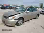 2002 Toyota Camry XLE with VIN 4T1BF32K42U025479, listed as a Copart auction lot 71116785 with 241,787 mi miles and Salvage title. Bid and sale history available at DreamBid. Image 1.