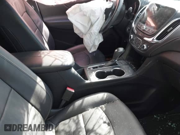2021 Chevrolet Equinox Premier z VIN 2GNAXXEV4M6144507, wystawiony jako IAAI lot #43070178 z przebiegiem 43 748 mil mil oraz . Historia ofert i sprzedaży dostępna na DreamBid. Obrazek 5.