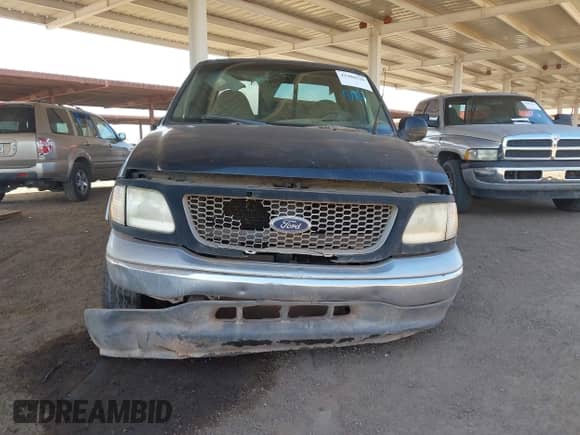 1999 Ford F-150 XL with VIN 1FTRX17L8XKA30905, listed as a IAAI auction lot 41980520 with 309,572 mi miles and . Bid and sale history available at DreamBid. Image 6.
