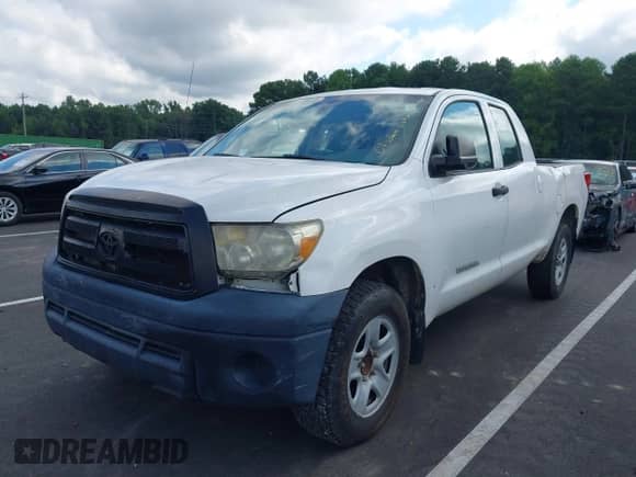 2012 Toyota Tundra z VIN 5TFRU5F10CX026554, wystawiony jako IAAI lot #43010233 z przebiegiem 221 656 mil mil oraz . Historia ofert i sprzedaży dostępna na DreamBid. Obrazek 2.