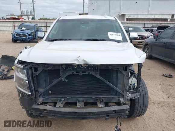 2017 Chevrolet Tahoe Premier z VIN 1GNSCCKC8HR255664, wystawiony jako IAAI lot #42020480 z przebiegiem 97 968 mil mil oraz . Historia ofert i sprzedaży dostępna na DreamBid. Obrazek 13.