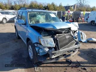 2009 Mercury Mariner Hybrid with VIN 4M2CU29359KJ04974, listed as a IAAI auction lot 41737749 with 150,783 mi miles and . Bid and sale history available at DreamBid. Image 1.