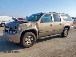 2007 Chevrolet Suburban LS с VIN 1GNFC16J07R219433, выставлен на аукционе Copart как лот 81949055 с пробегом 346 608 миль миль и Списание • Salvage title. История ставок и продаж доступна на DreamBid. Изображение 1.