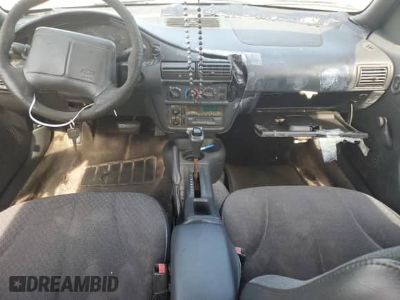 1998 Chevrolet Cavalier с VIN 1G1JC524XW7305314, выставлен на аукционе Copart как лот 64360485 с пробегом Не указан миль и Списание • Salvage title. История ставок и продаж доступна на DreamBid. Изображение 8.