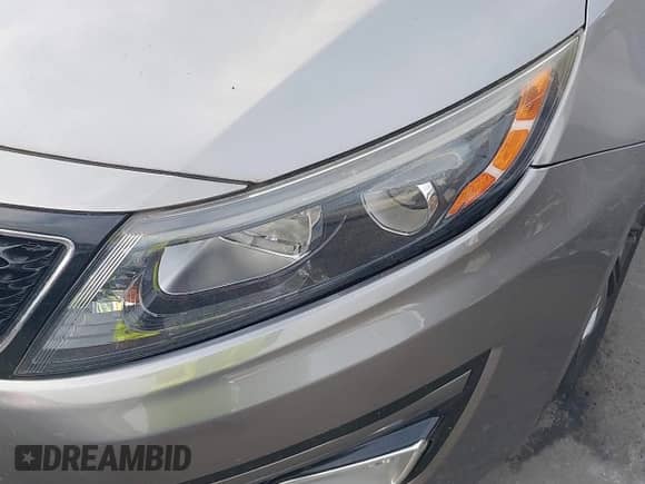 2014 Kia Optima LX with VIN 5XXGM4A72EG261688, listed as a IAAI auction lot 43439480 with 92,453 mi miles and . Bid and sale history available at DreamBid. Image 6.