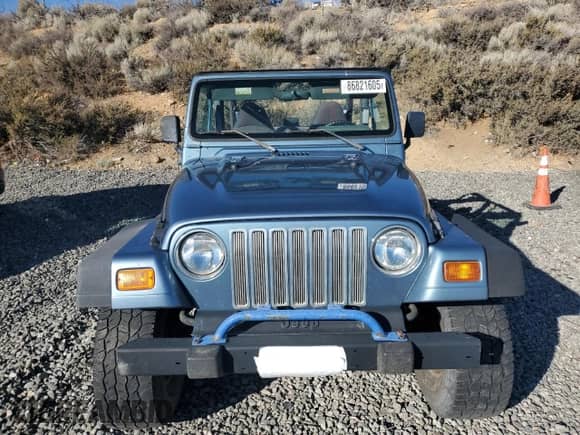 1999 Jeep Wrangler Sport with VIN 1J4FY19S1XP455674, listed as a Copart auction lot 86821605 with 218,356 mi miles and Clean title. Bid and sale history available at DreamBid. Image 5.