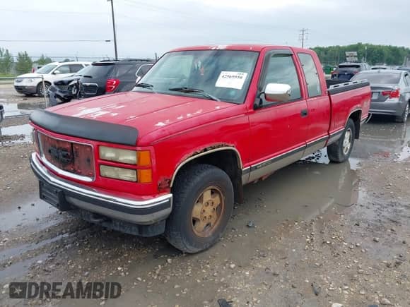 1994 GMC Sierra 1500 z VIN 2GTEK19K4R1548045, wystawiony jako IAAI lot #42569550 z przebiegiem 182 287 mil mil oraz . Historia ofert i sprzedaży dostępna na DreamBid. Obrazek 2.