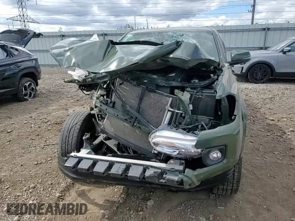 2022 Toyota Tacoma SR5 with VIN 3TMDZ5BN8NM127998, listed as a Copart auction lot 71539915 with 55,895 mi miles and Salvage title. Bid and sale history available at DreamBid. Image 14.