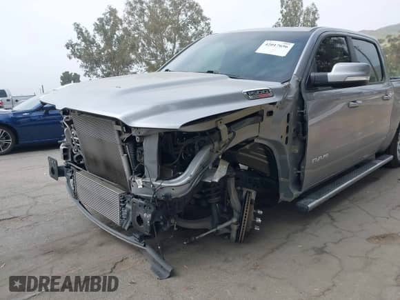 2020 Ram 1500 Lone Star z VIN 1C6RREFM6LN398253, wystawiony jako IAAI lot #42017656 z przebiegiem 84 669 mil mil oraz . Historia ofert i sprzedaży dostępna na DreamBid. Obrazek 6.