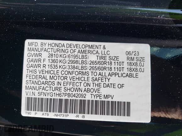 2023 Honda Pilot TrailSport with VIN 5FNYG1H67PB042092, listed as a IAAI auction lot 42376552 with 24,201 mi miles and . Bid and sale history available at DreamBid. Image 9.
