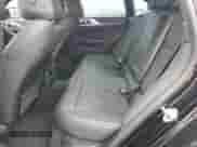 2024 BMW i4 eDrive35 with VIN WBY43AW05RFS57427, listed as a Copart auction lot 65464855 with 7,096 mi miles and Salvage title. Bid and sale history available at DreamBid. Image 10.