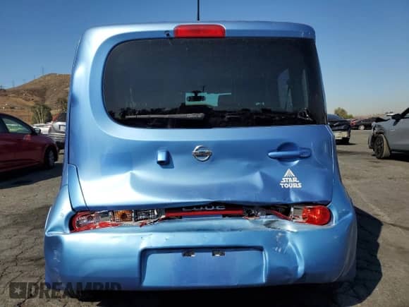 2012 Nissan Cube S z VIN JN8AZ2KR6CT255731, wystawiony jako Copart lot #70279975 z przebiegiem Nie podano mil oraz Szkoda całkowita • Salvage title. Historia ofert i sprzedaży dostępna na DreamBid. Obrazek 6.