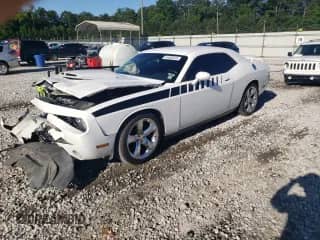 2012 Dodge Challenger R/T Plus with VIN 2C3CDYBT5CH281000, listed as a Copart auction lot 61430315 with 134,819 mi miles and Salvage title. Bid and sale history available at DreamBid. Image 1.