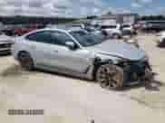 2022 BMW i4 eDrive40 with VIN WBY73AW02NFN19184, listed as a Copart auction lot 65177855 with 51,273 mi miles and Salvage title. Bid and sale history available at DreamBid. Image 4.