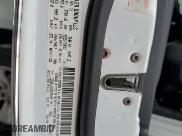 2013 Ram 1500 SLT z VIN 1C6RR6LGXDS523469, wystawiony jako Copart lot #57797915 z przebiegiem 176 559 mil mil oraz Szkoda całkowita • Salvage title. Historia ofert i sprzedaży dostępna na DreamBid. Obrazek 12.