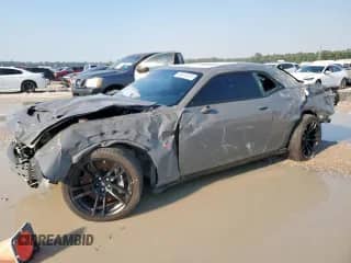 2023 Dodge Challenger R/T Scat Pack with VIN 2C3CDZFJ9PH688631, listed as a Copart auction lot 80074055 with 12,991 mi miles and Salvage title. Bid and sale history available at DreamBid. Image 1.