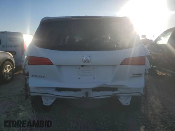 2016 Honda Pilot Touring z VIN 5FNYF6H90GB047709, wystawiony jako Copart lot #84041635 z przebiegiem 112 345 mil mil oraz Szkoda całkowita • Salvage title. Historia ofert i sprzedaży dostępna na DreamBid. Obrazek 6.