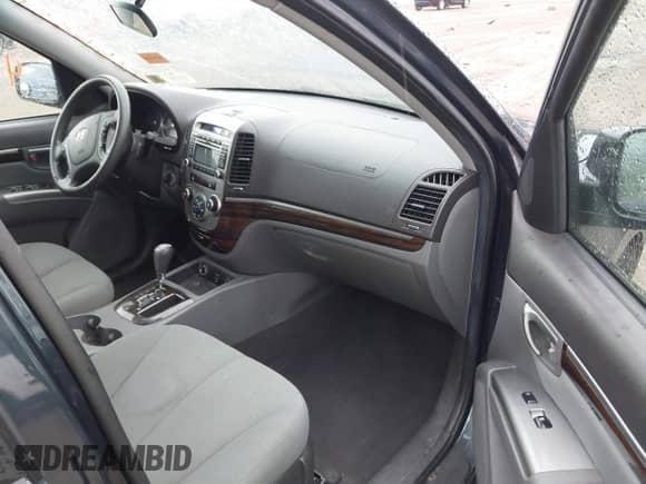 2012 Hyundai Santa Fe GLS с VIN 5XYZGDAB6CG126033, выставлен на аукционе IAAI как лот 43261351 с пробегом 166 055 миль миль и . История ставок и продаж доступна на DreamBid. Изображение 5.