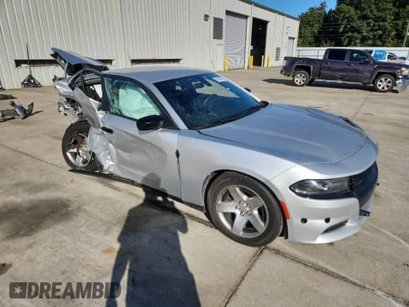 2018 Dodge Charger Police with VIN 2C3CDXAT3JH244407, listed as a Copart auction lot 85358415 with Not provided miles and Salvage title. Bid and sale history available at DreamBid. Image 4.