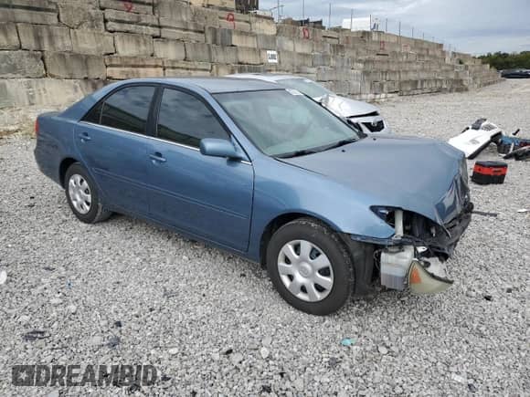 2002 Toyota Camry LE с VIN 4T1BE32K92U528069, выставлен на аукционе Copart как лот 82250395 с пробегом 150 308 миль миль и Списание • Salvage title. История ставок и продаж доступна на DreamBid. Изображение 4.
