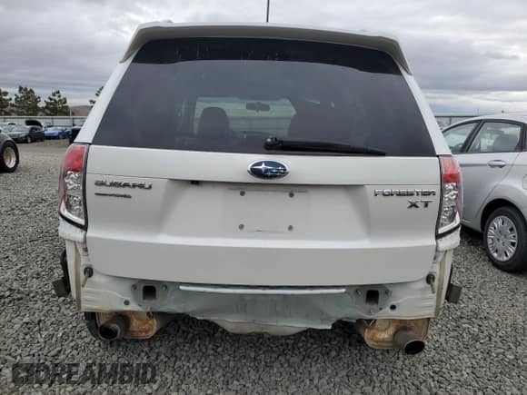 2013 Subaru Forester XT Touring с VIN JF2SHGGC6DH434166, выставлен на аукционе Copart как лот 82132484 с пробегом 174 442 миль миль и Списание • Salvage title. История ставок и продаж доступна на DreamBid. Изображение 6.